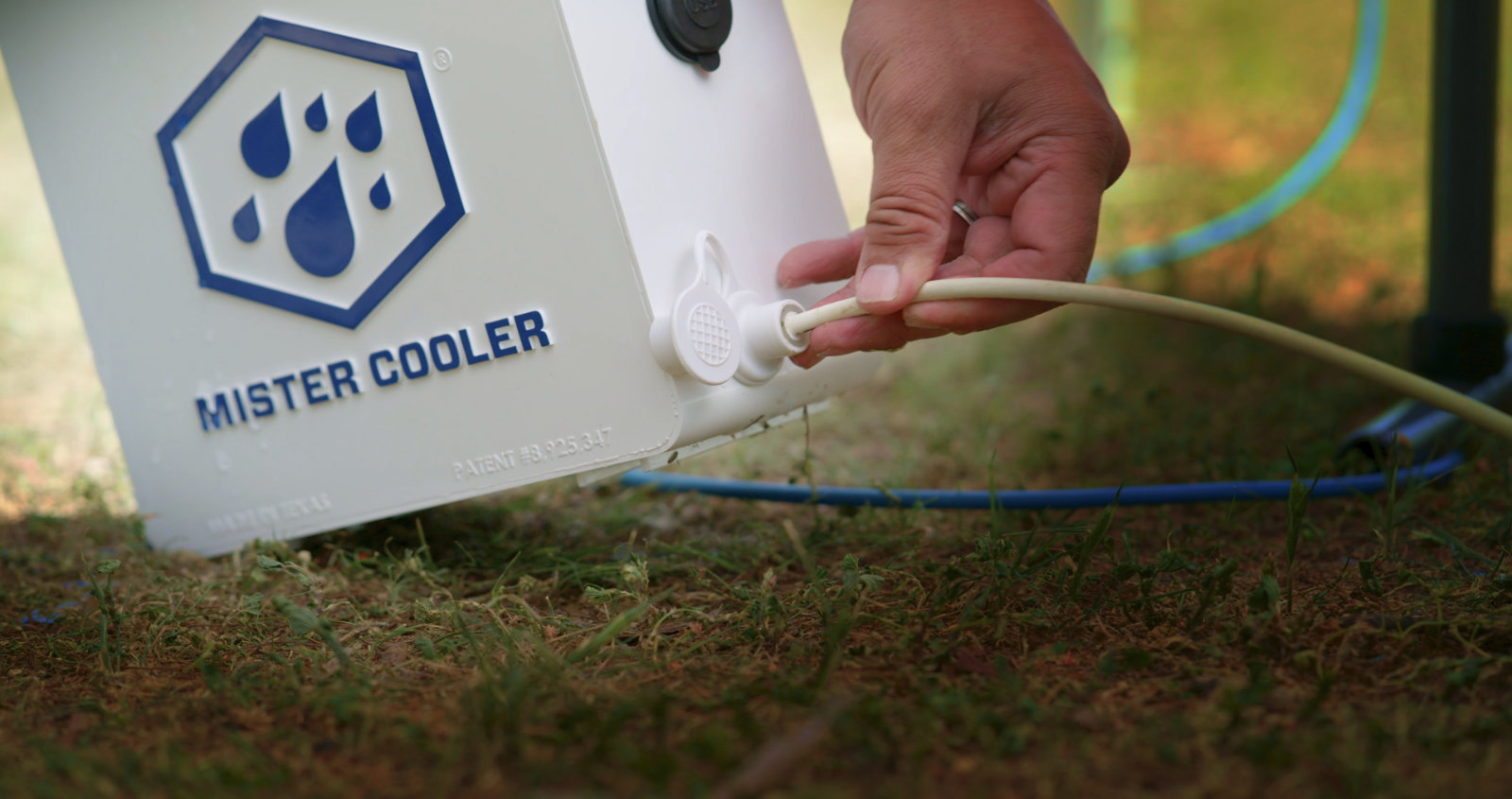 Attach the drain line to the input valve of the MISTER COOLER unit.